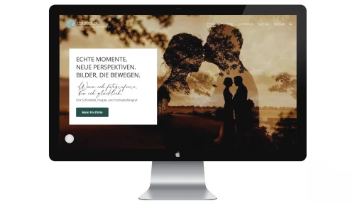 Zu sehen ist ein IMac mit der Startseite des Fotografen Dirk Schönfeldt.